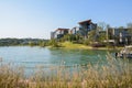 Lakeside modern buildings in sunny winter morning