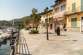 Lakeside promenade in ancient village Pella on the shore of Lake Orta, province of Novara, Italy Royalty Free Stock Photo