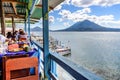 Lakeside restaurant & volcanoes, Panajachel, Lake Atitlan, Guatemala