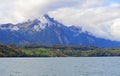 Lakeside view of landscape composed of houses, buildings, and trees. Royalty Free Stock Photo