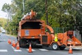 Wood chipper blowing tree branches cut A tree chipper or wood chipper is a portable machine used for reducing wood into smaller Royalty Free Stock Photo