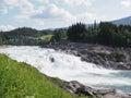 Laksforsen waterfall at Vefsna river in Grane village in Norway Royalty Free Stock Photo