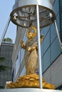 Lakshmi is one of the principal Hindu goddesses, depicted here as an elegant, golden-colored woman standing on a lotus throne Royalty Free Stock Photo