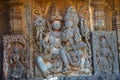 Lakshmi sitting in the lap of Vishnu. Hoysalesvara Temple, Halebid, Karnataka