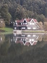 the lakside house in the naturel park in the evening Royalty Free Stock Photo