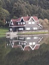 the lakside house in the naturel park in the evening Royalty Free Stock Photo