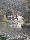 the lakside house in the naturel park in the evening Royalty Free Stock Photo