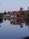 the lakside house in the naturel park in the evening Royalty Free Stock Photo