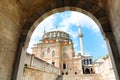 Laleli Mosque also known a Tulip mosque with blue cloudy sky. View from the gate. Royalty Free Stock Photo