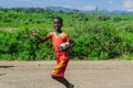 Poor Ethiopian Children smiling on the rural road