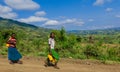 Poor Ethiopian People smiling on the rural road