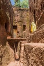 LALIBELA, ETHIOPIA - MARCH 29, 2019: Narrow passage in front of Bet Golgotha and Bet Mikael rock-cut churches in