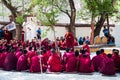 Lama debating Buddhist scriptures Royalty Free Stock Photo