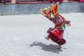 Monk with colored clothes and mask performs Cham dances, ritual dancing at Takthok festival, Ladakh, Lamayuru Gompa, India