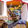 Buddhist lamas dressed in mystical mask dancing Tsam mystery dance in time of Yuru Kabgyat Buddhist festival at Lamayuru Gompa, La Royalty Free Stock Photo