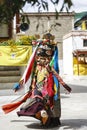 LAMAYURU, INDIA - SETEMBER 13, 2015: An unidentified buddhist lamas dressed in mystical mask dancing Tsam mystery dance in time of Royalty Free Stock Photo