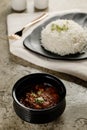 Lamb Bamia with white rice served in a dish isolated on grey background side view fast food