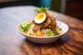 lamb biryani plated with slices of boiled egg Royalty Free Stock Photo