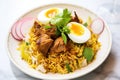 lamb biryani plated with slices of boiled egg Royalty Free Stock Photo