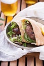 Lamb burgers in a pita Royalty Free Stock Photo