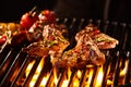 Lamb chop being grilled under flames Royalty Free Stock Photo