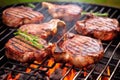 lamb chops on a grill with thick barbecue smoke