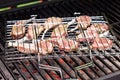 Lamb chops in grilling basket on grill Royalty Free Stock Photo