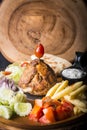 Lamb Gyros kebab served with bread,french fries and salad Royalty Free Stock Photo