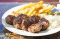 Lamb kofta with rice and fries