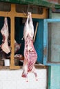 Lamb meat hanging in a butcher shop. Srinagar, India