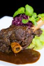 Lamb shank braised in an onion jus Royalty Free Stock Photo