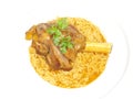 Lamb shank in juicy yellow rice