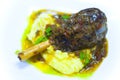 Lamb Shank on Potatoes