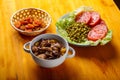 Lamb stewed with potatoes in spices and sauce next to dried fruits and vegetables iftar