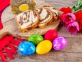 lamb tripe meat cake, sponge cake and colored easter eggs on table Royalty Free Stock Photo