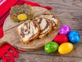 lamb tripe meat cake, sponge cake and colored easter eggs on table Royalty Free Stock Photo