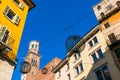 Lamberti Tower in Verona Torre dei Lamberti and surrounding colorful houses in the city center. Beautiful blue sky, winter time