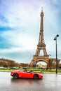 Lamborghini and Eiffel tower in Paris, France. Royalty Free Stock Photo
