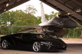 Lamborghini and F-16 Royalty Free Stock Photo