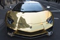 Lamborghini, gold colored sport car in the street