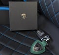 Lamborghini keychain and box in the car