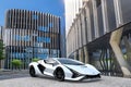 Lamborghini Sian on the background of a modern building