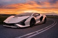 Lamborghini Sian FKP 37 on the road during a spectacular sunset