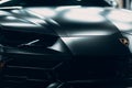 Lamborghini Urus black color sports car close up.