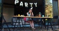 Lame birthday party on quarantine. Sad upset Caucasian young beautiful woman sits alone at home with cake slow motion.