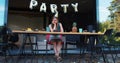 Lame birthday party on quarantine. Sad upset Caucasian young beautiful woman sits alone at home with cake slow motion.