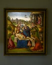 `Lamentation over Christ` by Tuscan Painter in The Pinacota Ambrosiana, the Ambrosian art gallery in Milan, Italy Royalty Free Stock Photo