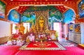 The altar of Viharn Phra Chao Lawo of Wat Phra That Hariphunchai Temple, on May 8 in Lamphun, Thailand