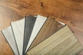 Laminate background. Samples of laminate or parquet with a pattern and wood texture for flooring and interior design. Production Royalty Free Stock Photo