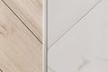 Laminate and tile floor joints - floor connector - decorative strip or sill Royalty Free Stock Photo